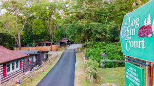 Main entrance to the log cabin motor court offering cabins for rent in the blue ridge mountains NC